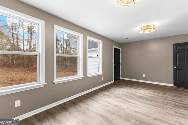 810 Callaway Church Rd, Lagrange, GA 30241 - empty room featuring plenty of natural light and wood finished floors