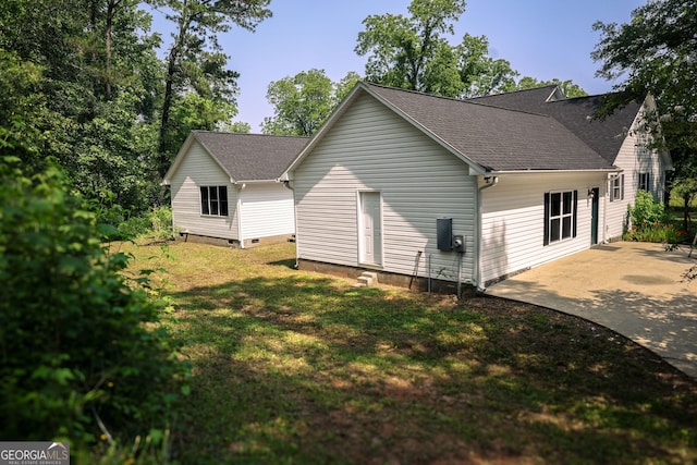 810 Callaway Church Rd, Lagrange, GA 30241 - back of house with a yard, a shingled roof, and a patio