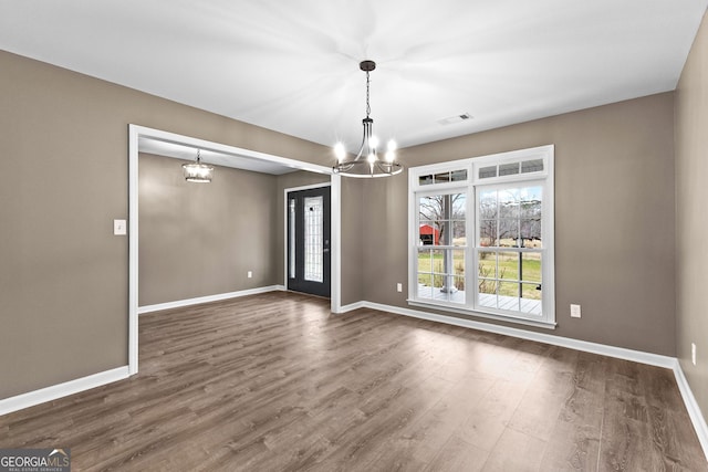 810 Callaway Church Rd, Lagrange, GA 30241 - unfurnished room featuring a chandelier and dark wood-style floors