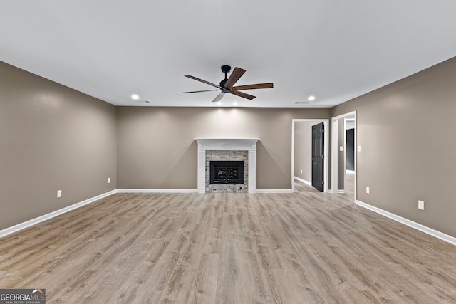 810 Callaway Church Rd, Lagrange, GA 30241 - unfurnished living room with ceiling fan, recessed lighting, a fireplace, and light wood-type flooring