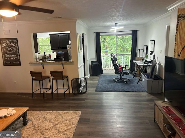 122 Sterling Ct Unit 122, Alpharetta, GA 30004 - living area with plenty of natural light, dark wood-style flooring, a ceiling fan, and ornamental molding