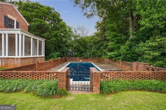 280 Blackland Rd NW, Atlanta, GA 30342 - view of pool featuring a fenced backyard, a sunroom, and a patio