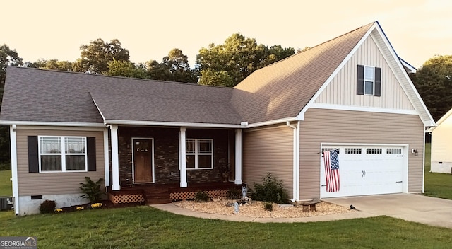 130 Burnt Hickory Ln, Calhoun, GA 30701 - view of front of house with covered porch, driveway, a front yard, and board and batten siding