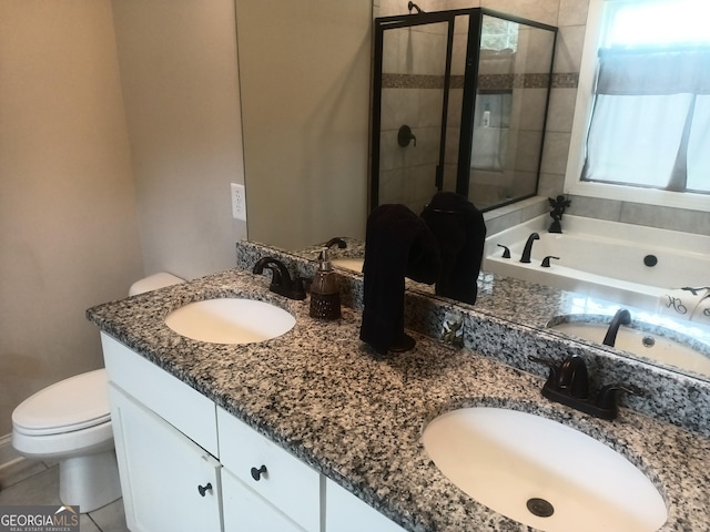 130 Burnt Hickory Ln, Calhoun, GA 30701 - bathroom with double vanity, toilet, a stall shower, a bath, and tile patterned flooring