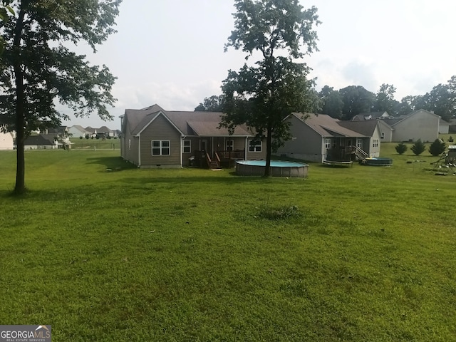 130 Burnt Hickory Ln, Calhoun, GA 30701 - view of grassy yard with an outdoor pool