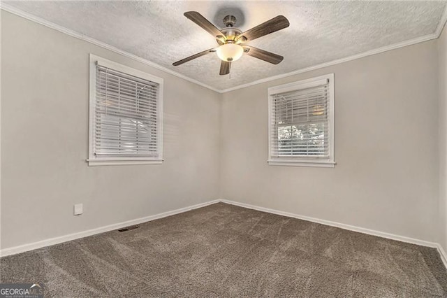 2576 Godfrey Dr, Atlanta, GA 30318 - carpeted spare room featuring a ceiling fan, a textured ceiling, baseboards, and crown molding