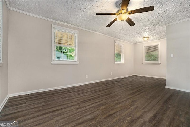 2576 Godfrey Dr, Atlanta, GA 30318 - spare room featuring dark wood finished floors, a textured ceiling, crown molding, ceiling fan, and baseboards