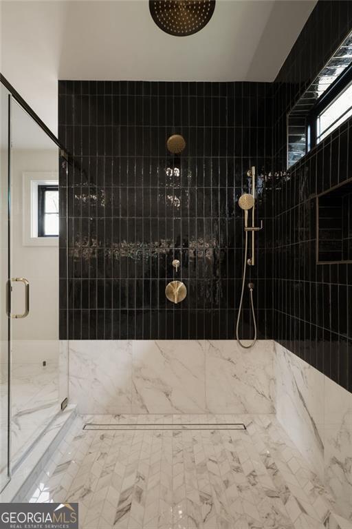 130 Nova Ln, Roswell, GA 30075 - full bath with a marble finish shower and marble look tile flooring