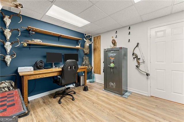437 Jewell Slaton Rd, Dawsonville, GA 30534 - office area featuring wood finished floors, a paneled ceiling, and baseboards