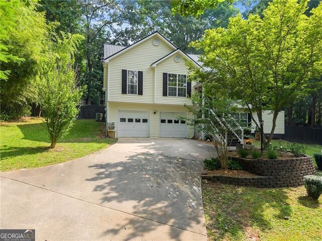 437 Jewell Slaton Rd, Dawsonville, GA 30534 - view of front of home with driveway, a garage, and metal roof