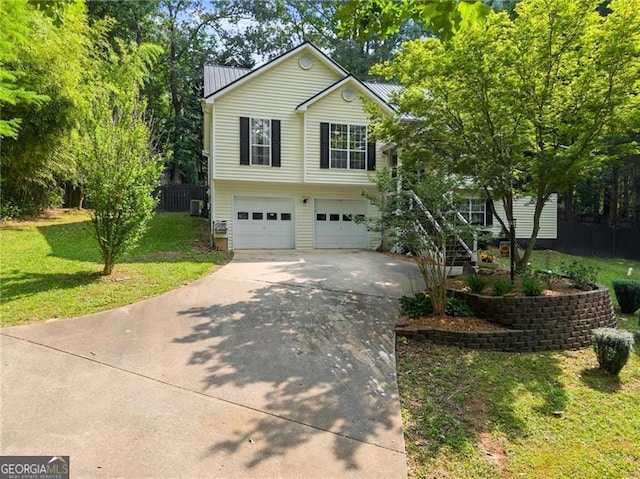 437 Jewell Slaton Rd, Dawsonville, GA 30534 - view of front of house with driveway, an attached garage, and metal roof