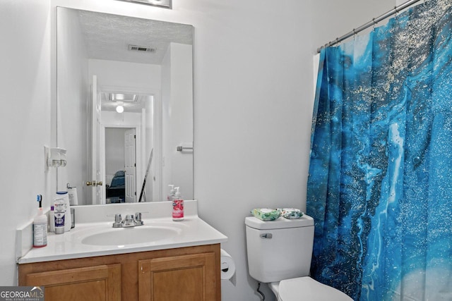 11581 Kades Trl, Hampton, GA 30228 - full bath with vanity, toilet, and a shower with shower curtain