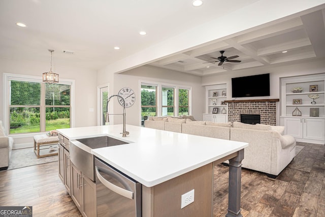 7345 Vale Ct, Cumming, GA 30028 - kitchen featuring stainless steel dishwasher, a sink, healthy amount of natural light, recessed lighting, and a ceiling fan