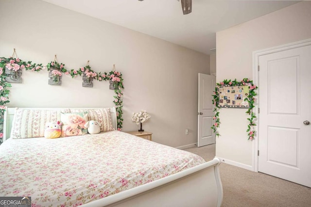 7345 Vale Ct, Cumming, GA 30028 - bedroom featuring light carpet, baseboards, and a ceiling fan