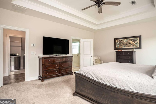 7345 Vale Ct, Cumming, GA 30028 - carpeted bedroom with ornamental molding, a tray ceiling, baseboards, and ceiling fan