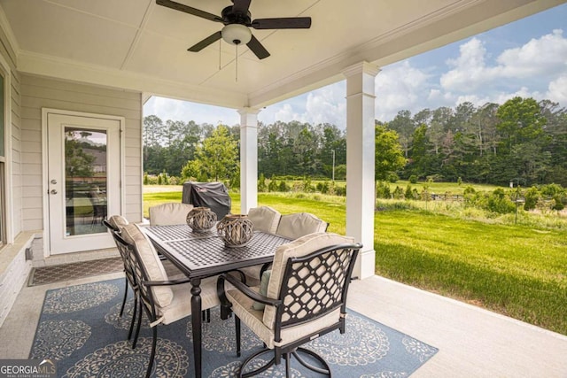 7345 Vale Ct, Cumming, GA 30028 - view of patio featuring ceiling fan, outdoor dining space, view of wooded area, and grilling area