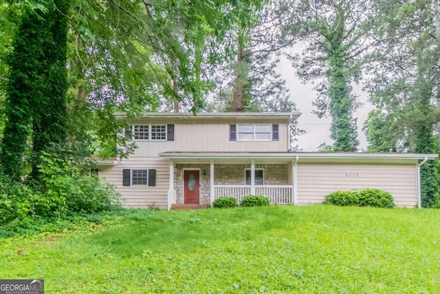 4715 Wildginger Run, Lithonia, GA 30038 - traditional-style house with covered porch and a front lawn