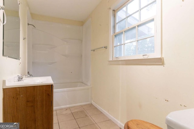 4715 Wildginger Run, Lithonia, GA 30038 - full bathroom featuring toilet, vanity, tile patterned flooring, shower / washtub combination, and plenty of natural light
