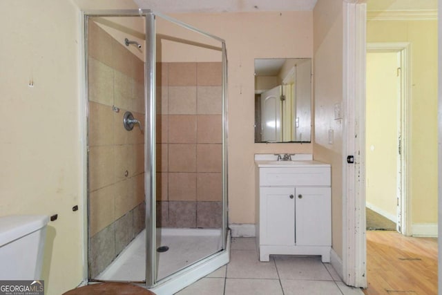 4715 Wildginger Run, Lithonia, GA 30038 - full bathroom with vanity, a stall shower, toilet, and tile patterned flooring