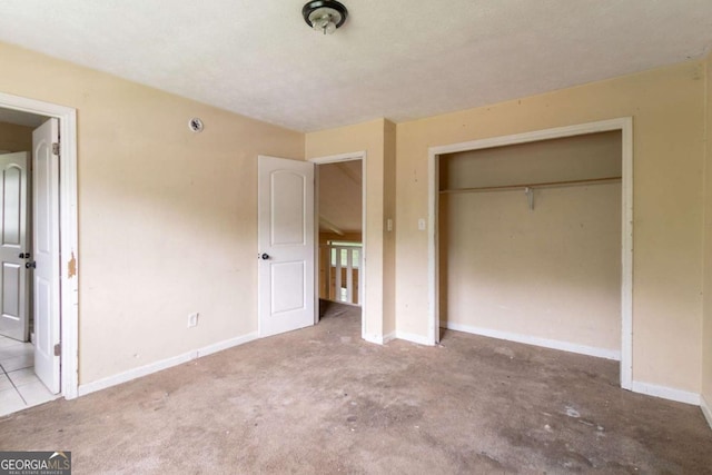 4715 Wildginger Run, Lithonia, GA 30038 - unfurnished bedroom featuring a closet and baseboards