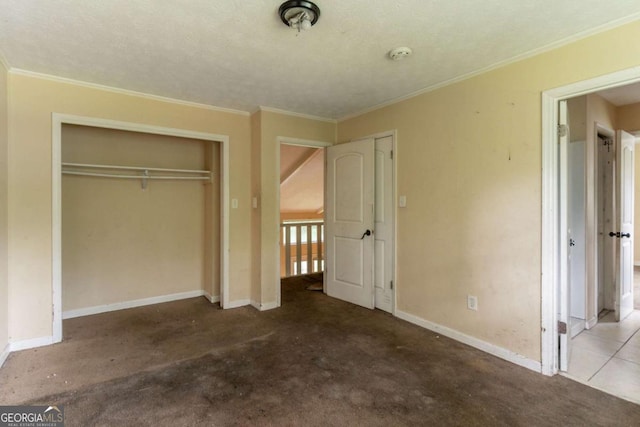 4715 Wildginger Run, Lithonia, GA 30038 - unfurnished bedroom featuring a closet, baseboards, and ornamental molding