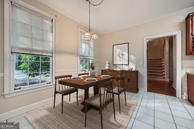 7155 Roswell Rd Unit 58, Atlanta, GA 30328 - dining area featuring stairs, ornamental molding, light tile patterned floors, a chandelier, and baseboards