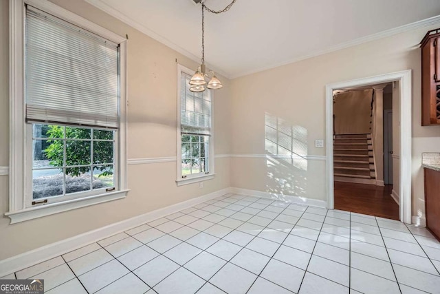 7155 Roswell Rd Unit 58, Atlanta, GA 30328 - spare room featuring crown molding, light tile patterned floors, stairway, a chandelier, and baseboards