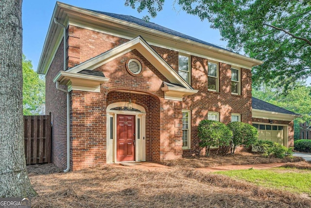 7155 Roswell Rd Unit 58, Atlanta, GA 30328 - view of front of home featuring an attached garage and brick siding