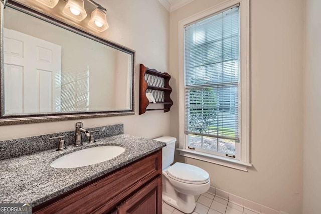 7155 Roswell Rd Unit 58, Atlanta, GA 30328 - bathroom featuring toilet, tile patterned flooring, vanity, ornamental molding, and baseboards