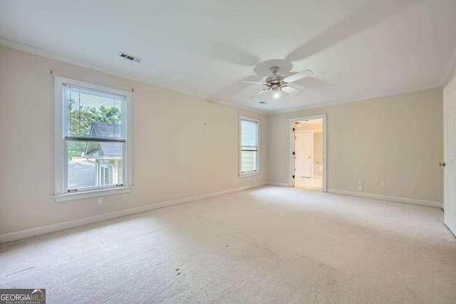7155 Roswell Rd Unit 58, Atlanta, GA 30328 - unfurnished room featuring baseboards, ceiling fan, light carpet, and crown molding