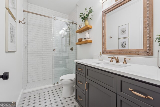 712 Brookshade Pkwy, Alpharetta, GA 30004 - full bath with toilet, vanity, a stall shower, and tile patterned floors