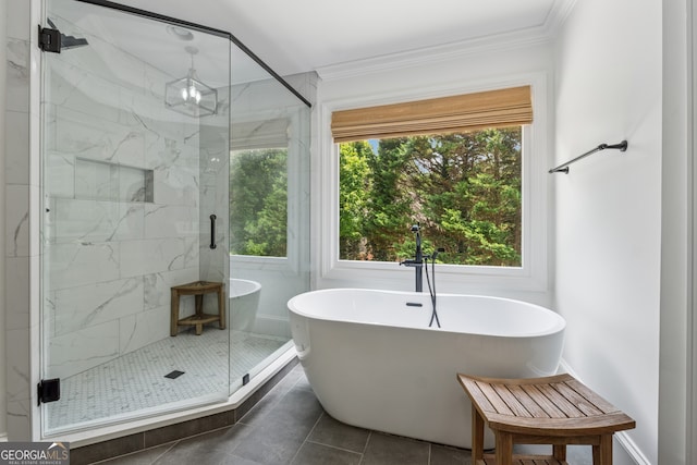 712 Brookshade Pkwy, Alpharetta, GA 30004 - bathroom featuring ornamental molding, a freestanding tub, a marble finish shower, and tile patterned floors