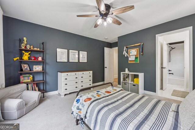 712 Brookshade Pkwy, Alpharetta, GA 30004 - carpeted bedroom with baseboards, a ceiling fan, and connected bathroom
