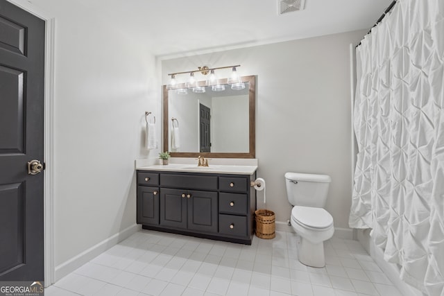 712 Brookshade Pkwy, Alpharetta, GA 30004 - full bath featuring vanity, toilet, tile patterned flooring, and baseboards