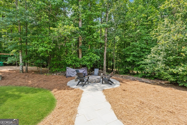 712 Brookshade Pkwy, Alpharetta, GA 30004 - view of yard featuring a fire pit and a patio
