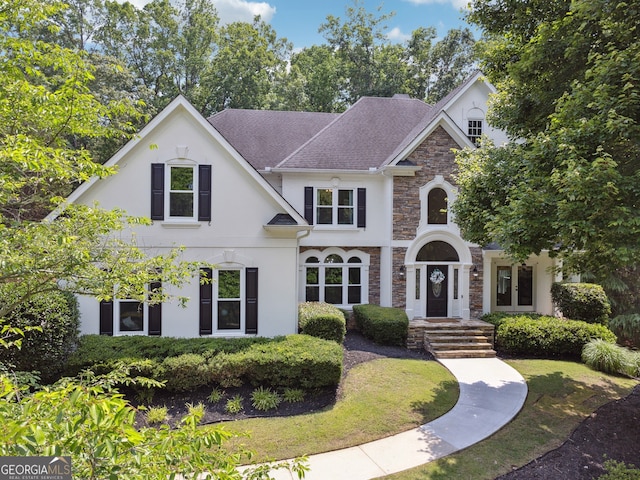 712 Brookshade Pkwy, Alpharetta, GA 30004 - view of front of house featuring stucco siding and stone siding