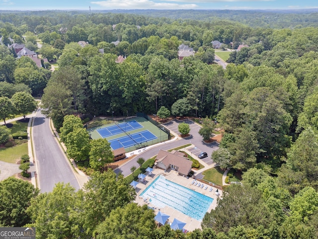 712 Brookshade Pkwy, Alpharetta, GA 30004 - aerial view of a heavily wooded area and a pool area