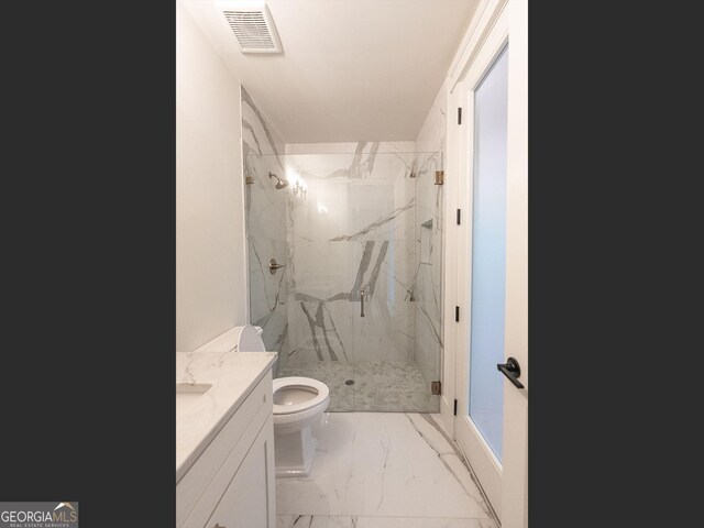 4955 Chamblee Dunwoody Rd, Dunwoody, GA 30338 - full bath with marble look tile flooring, a marble finish shower, and vanity