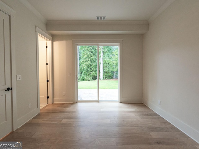 4955 Chamblee Dunwoody Rd, Dunwoody, GA 30338 - empty room with wood finished floors and ornamental molding