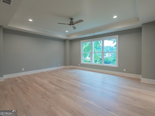 4955 Chamblee Dunwoody Rd, Dunwoody, GA 30338 - empty room with a raised ceiling, light wood-type flooring, ceiling fan, and recessed lighting