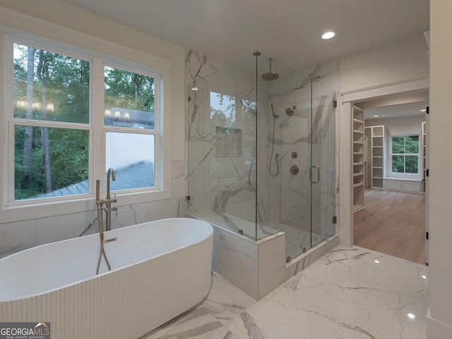 4955 Chamblee Dunwoody Rd, Dunwoody, GA 30338 - full bath with a marble finish shower, marble tiled flooring, a freestanding bath, a spacious closet, and recessed lighting
