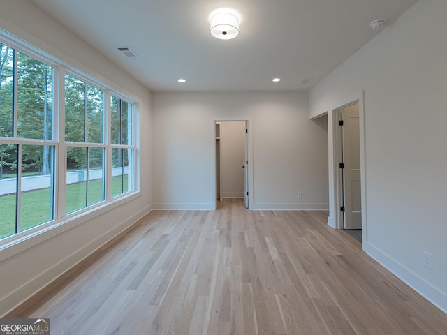 4955 Chamblee Dunwoody Rd, Dunwoody, GA 30338 - unfurnished room with light wood finished floors, a smoke detector, and recessed lighting