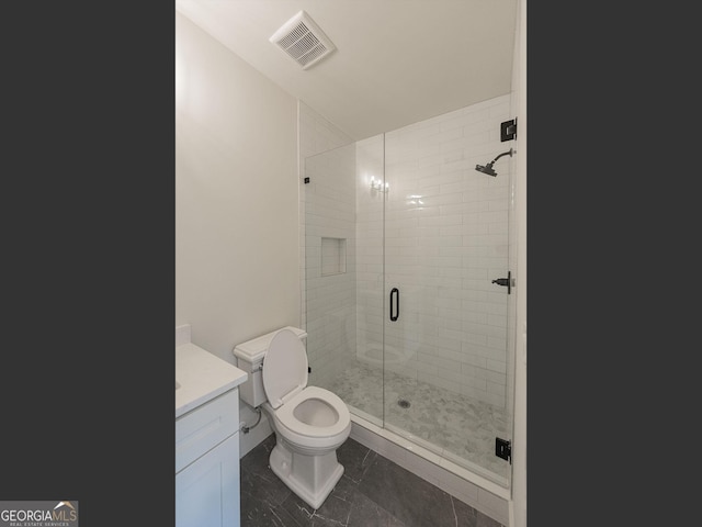 4955 Chamblee Dunwoody Rd, Dunwoody, GA 30338 - bathroom featuring a stall shower, vanity, and marble finish floors