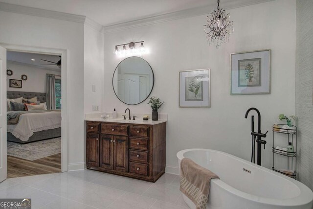 1488 Pleasant Hill Rd NE, Ranger, GA 30734 - ensuite bathroom with vanity, a freestanding tub, crown molding, tile patterned flooring, and baseboards