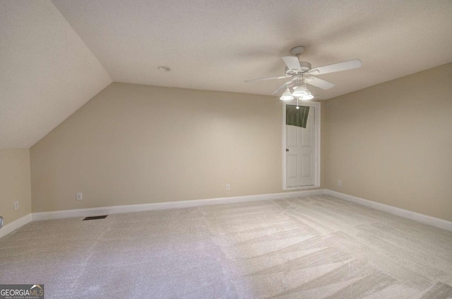 1488 Pleasant Hill Rd NE, Ranger, GA 30734 - additional living space with light carpet, a ceiling fan, baseboards, and lofted ceiling