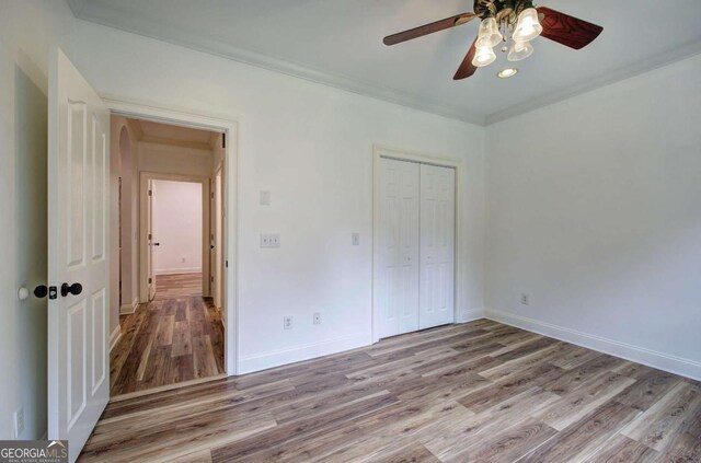 1488 Pleasant Hill Rd NE, Ranger, GA 30734 - unfurnished bedroom with light wood-type flooring, a closet, baseboards, recessed lighting, and a ceiling fan