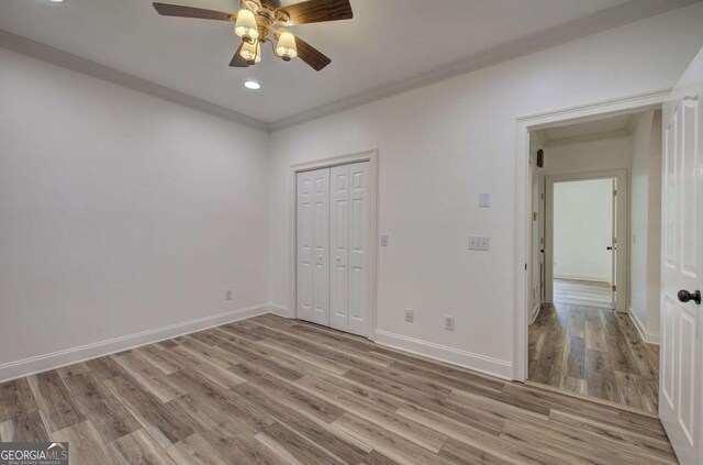 1488 Pleasant Hill Rd NE, Ranger, GA 30734 - unfurnished bedroom with light wood finished floors, baseboards, a closet, recessed lighting, and a ceiling fan