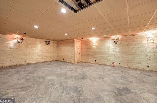 1488 Pleasant Hill Rd NE, Ranger, GA 30734 - empty room with a drop ceiling, wood walls, and recessed lighting