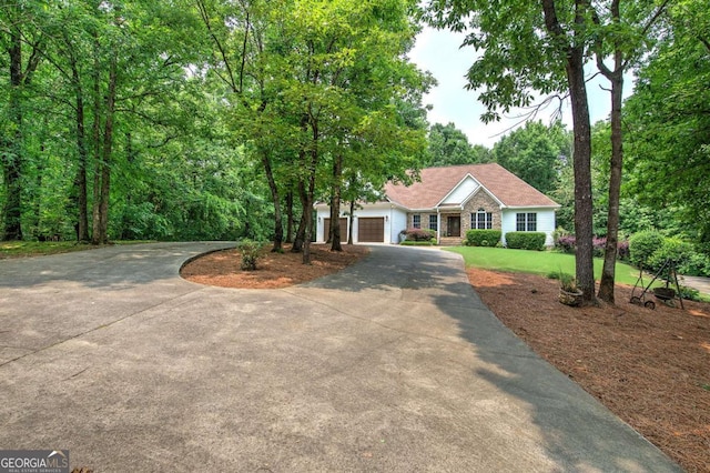 1488 Pleasant Hill Rd NE, Ranger, GA 30734 - single story home with curved driveway, a front yard, and an attached garage
