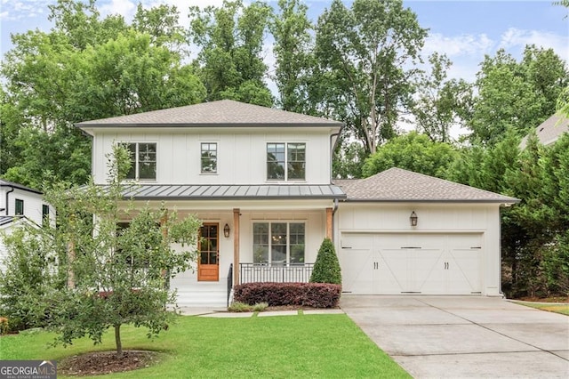 2602 Drew Valley Rd NE, Brookhaven, GA 30319 - modern farmhouse style home with a garage, driveway, a porch, a front yard, and board and batten siding